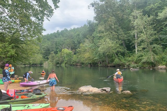 Kayakers Putting Their Boats In The Water